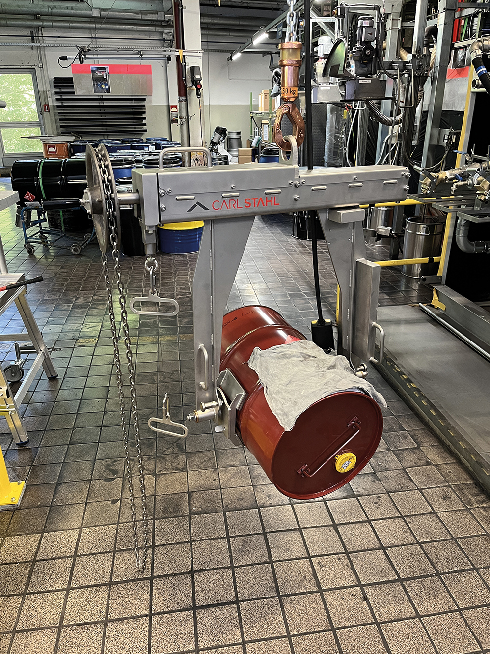 A photo showing a custom piece of lifting equipment designed to be able lift barrels.